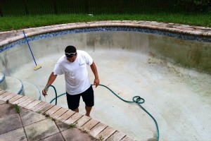Home pool cleaning in progress
